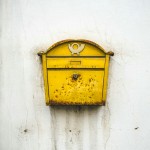 Wall mounted vintage Italian mail box with patina.